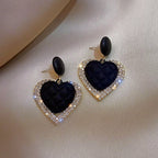 Boucles d'oreilles cœur en or noir