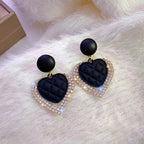 Boucles d'oreilles cœur en or noir