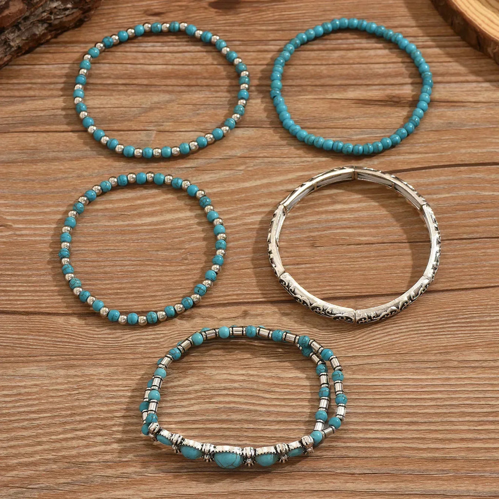 Conjunto de pulseras boho con perlas turquesas
