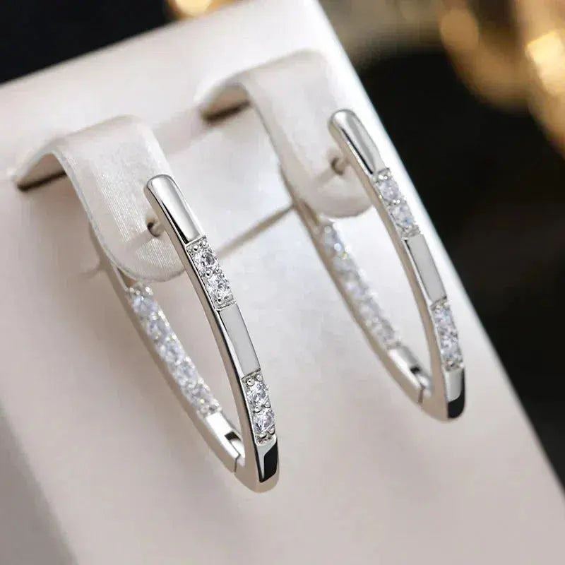 Boucles d'oreilles élégantes avec zircons